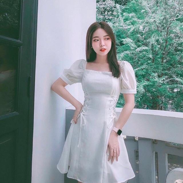 Đầm trắng xoè đan dây