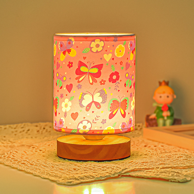 Cartoon bedroom bedside decoration table lamp simple personalized creative gift fabric warm solid wood dimming table lamp