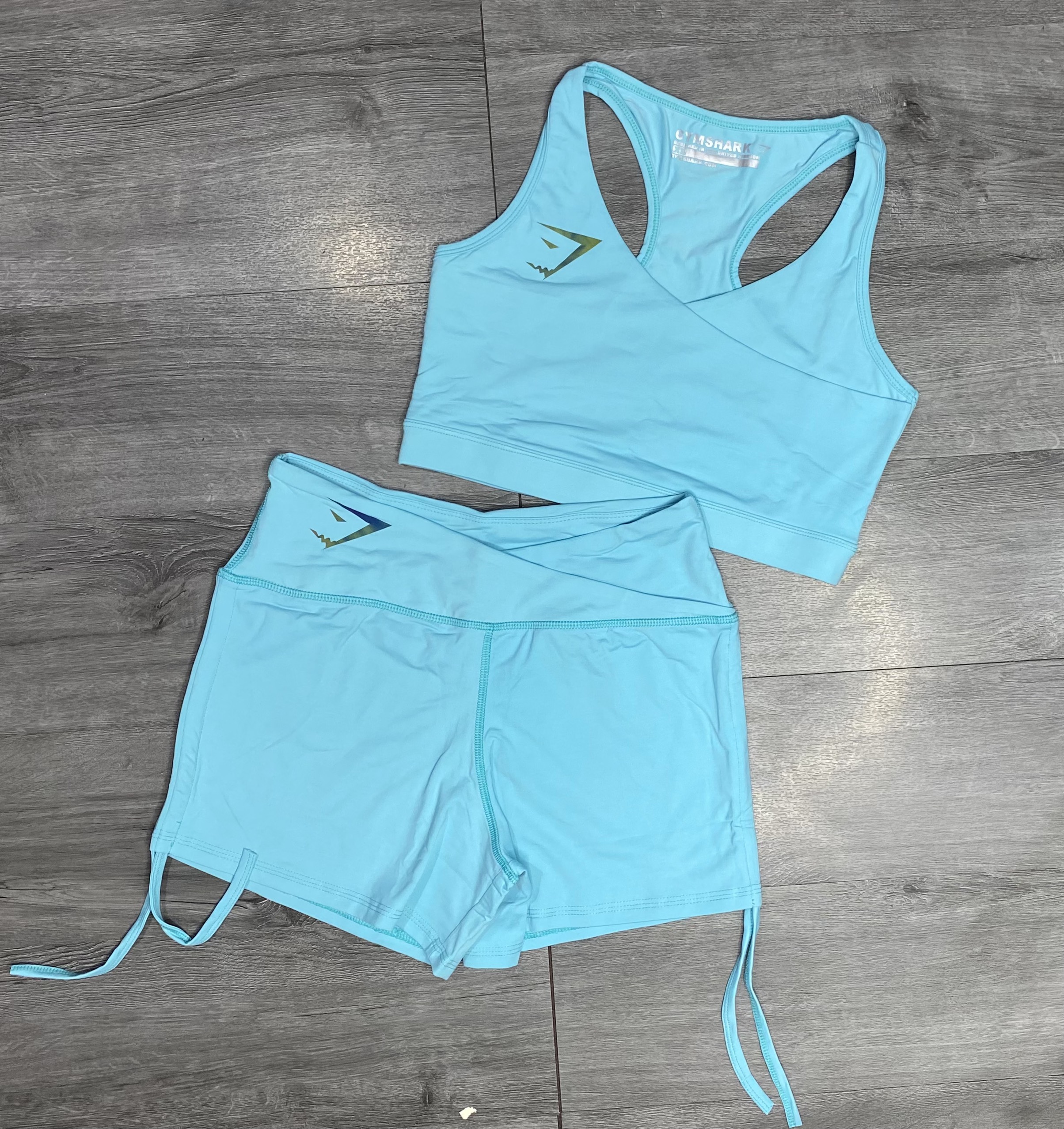 Bộ đồ tập gym yoga aerobic nữ quần áo tập gym yoga aerobic nữ dáng đẹp quần đùi dây rút cạp chéo áo bra sát nách kèm mút chất vải co gian 4 chiều Bin Sports BN023