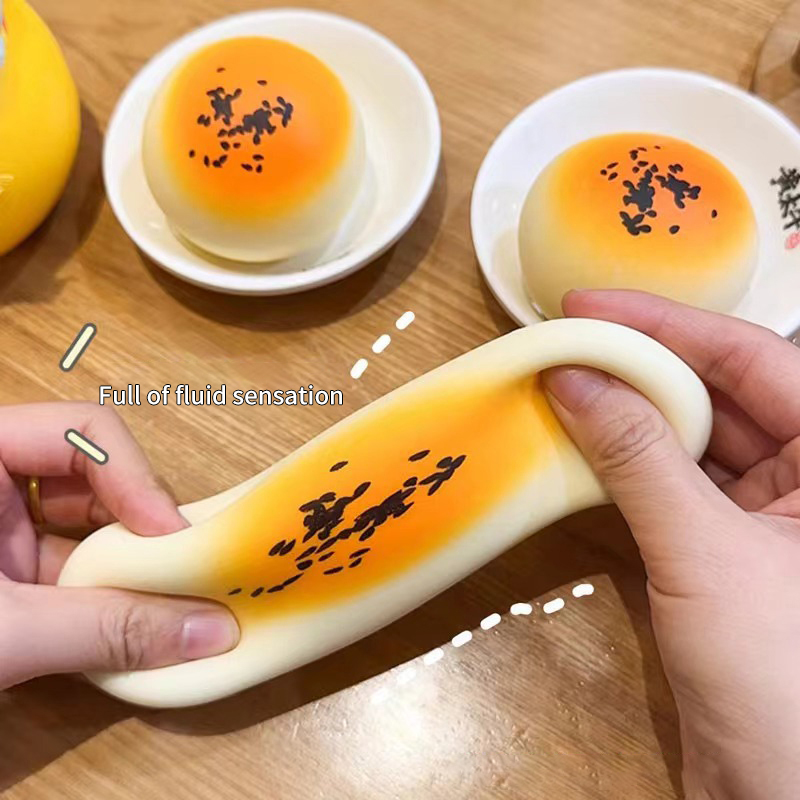Fluid%20Ball%20Squishy%20Toy%20Simulation%20Food%20Yolk%20Pastry%20Slow%20Rising%20Squeeze%20Toy%20BAWEI%20-%20Image%202