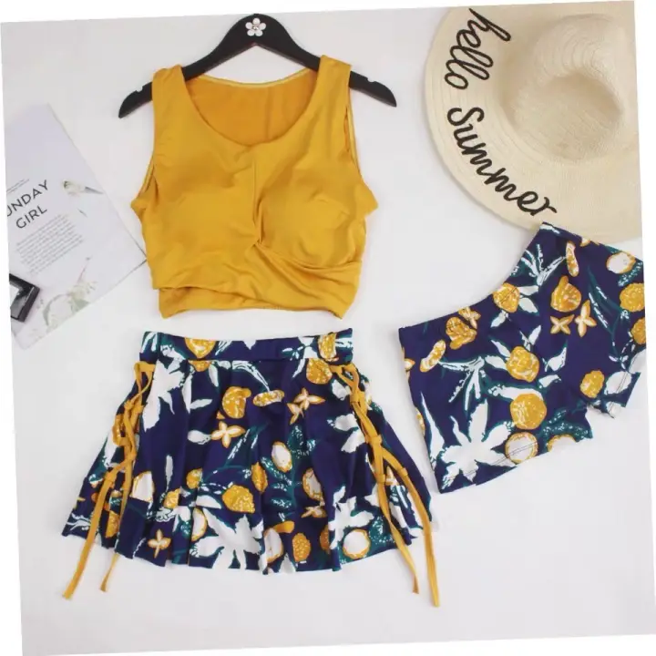 red top yellow skirt