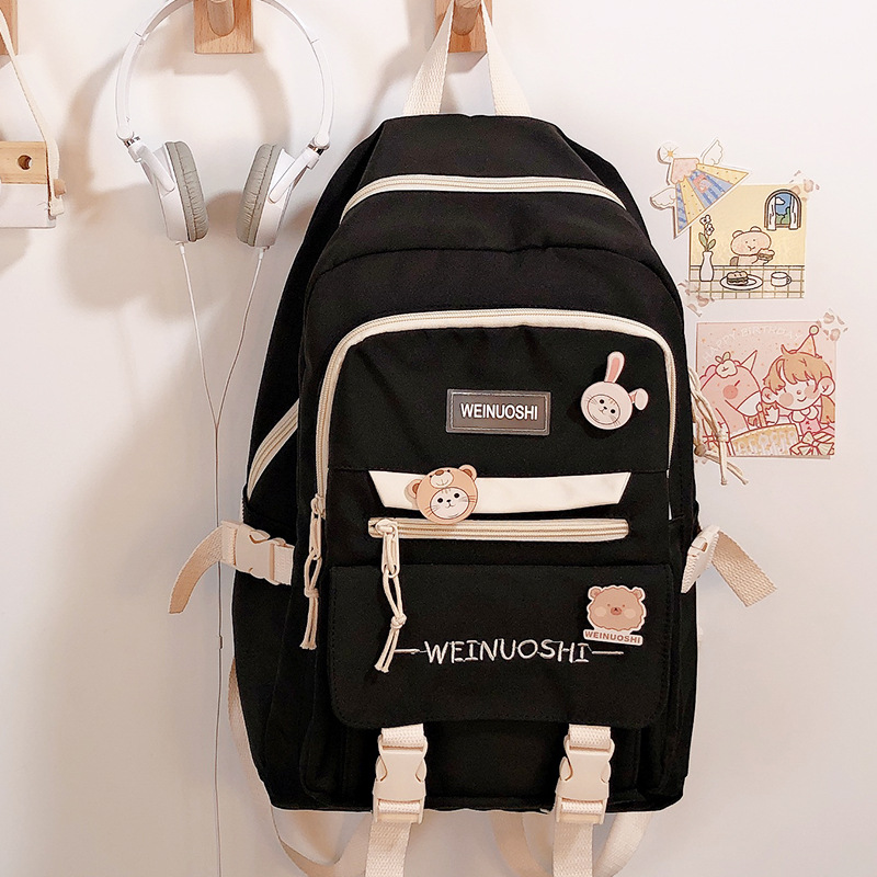 WOMA large-capacity schoolbag female junior high school students college students backpack high school students niche primary school students