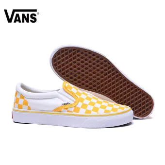 vans checkerboard slip ons yellow
