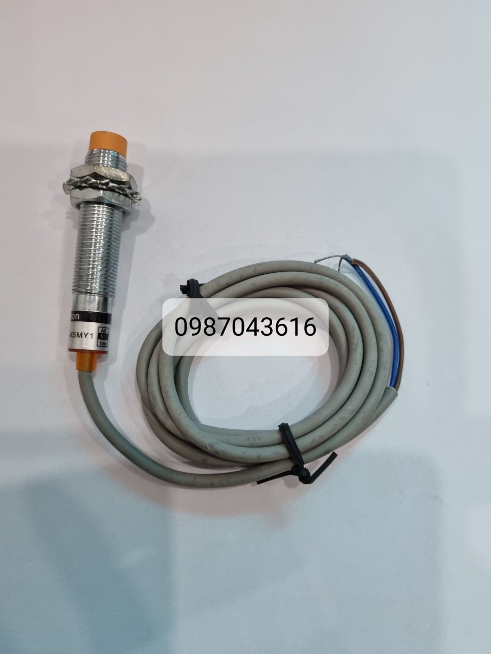 Cảm biến tiêm cận phi 12 omron e2e- x5my1 no 90-250vac