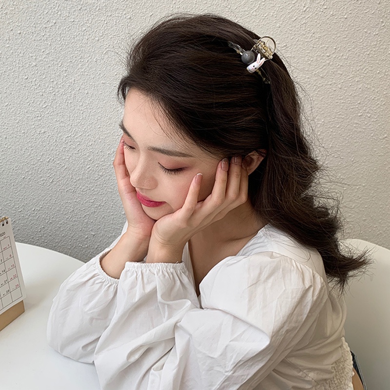 Gấp tóc nhựa trong 6cm họa tiết icon human
