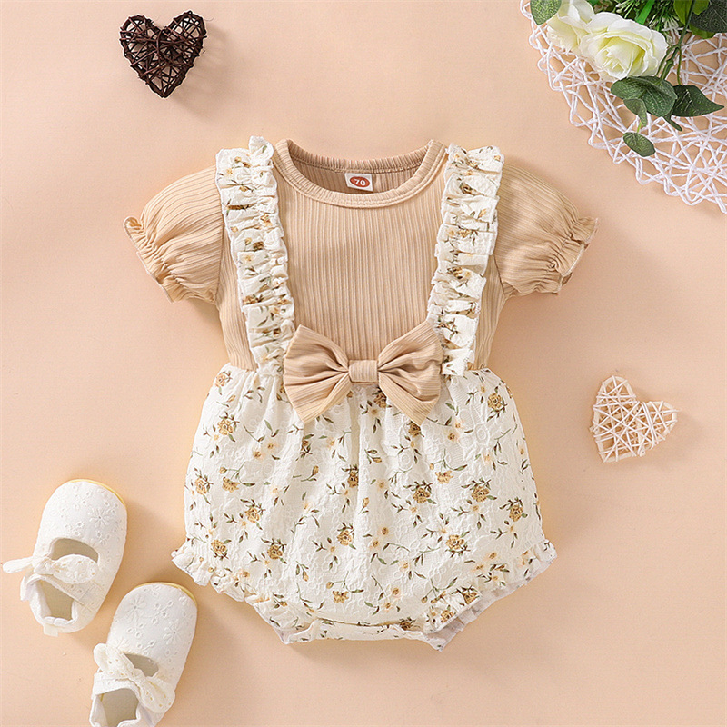 JOYNCLEON The new newborn baby jumpsuit with a buttocks and a floral bow is a fake two-piece triangular crawling suit.