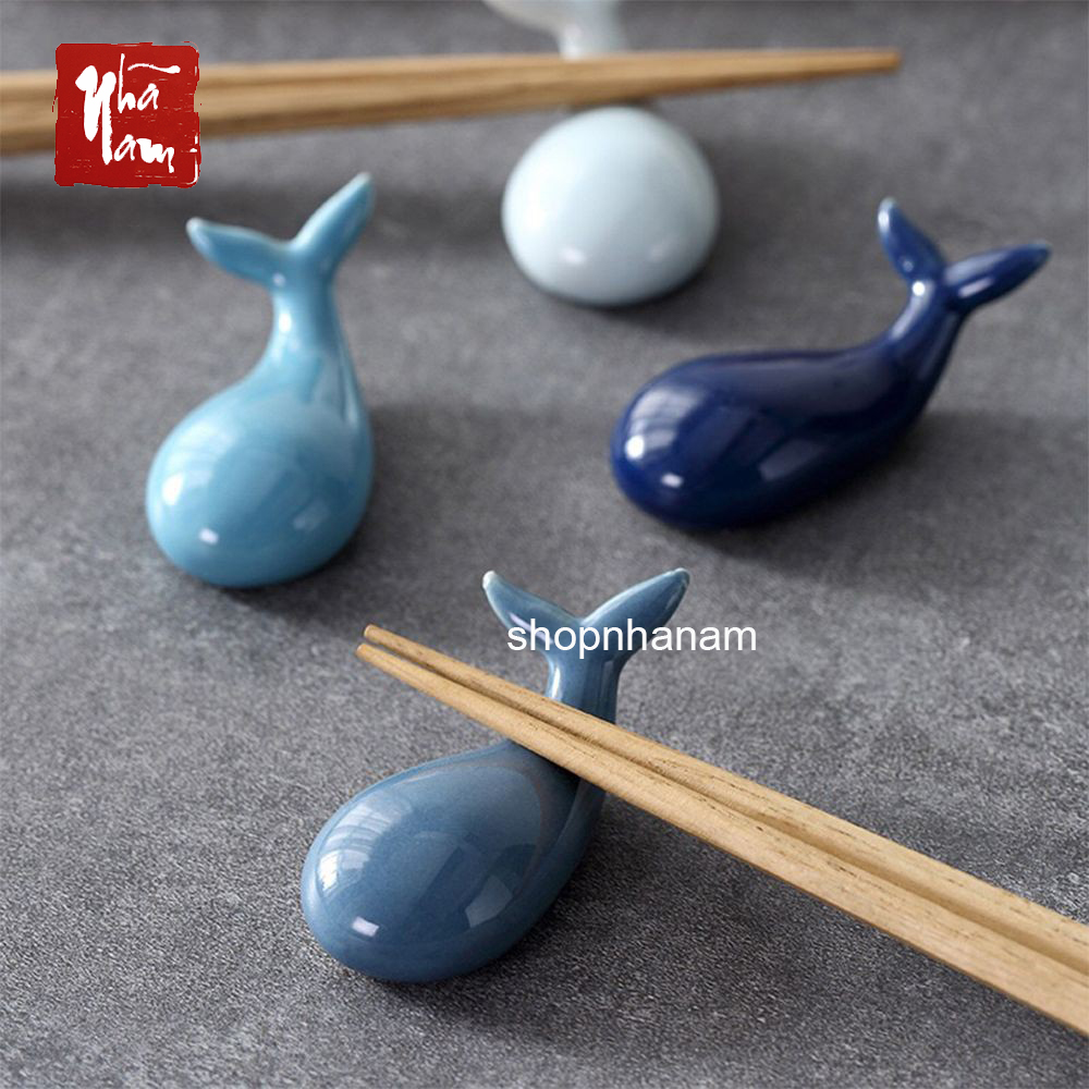 Ceramic Whale Statue Holding Chopsticks on the Dining Table