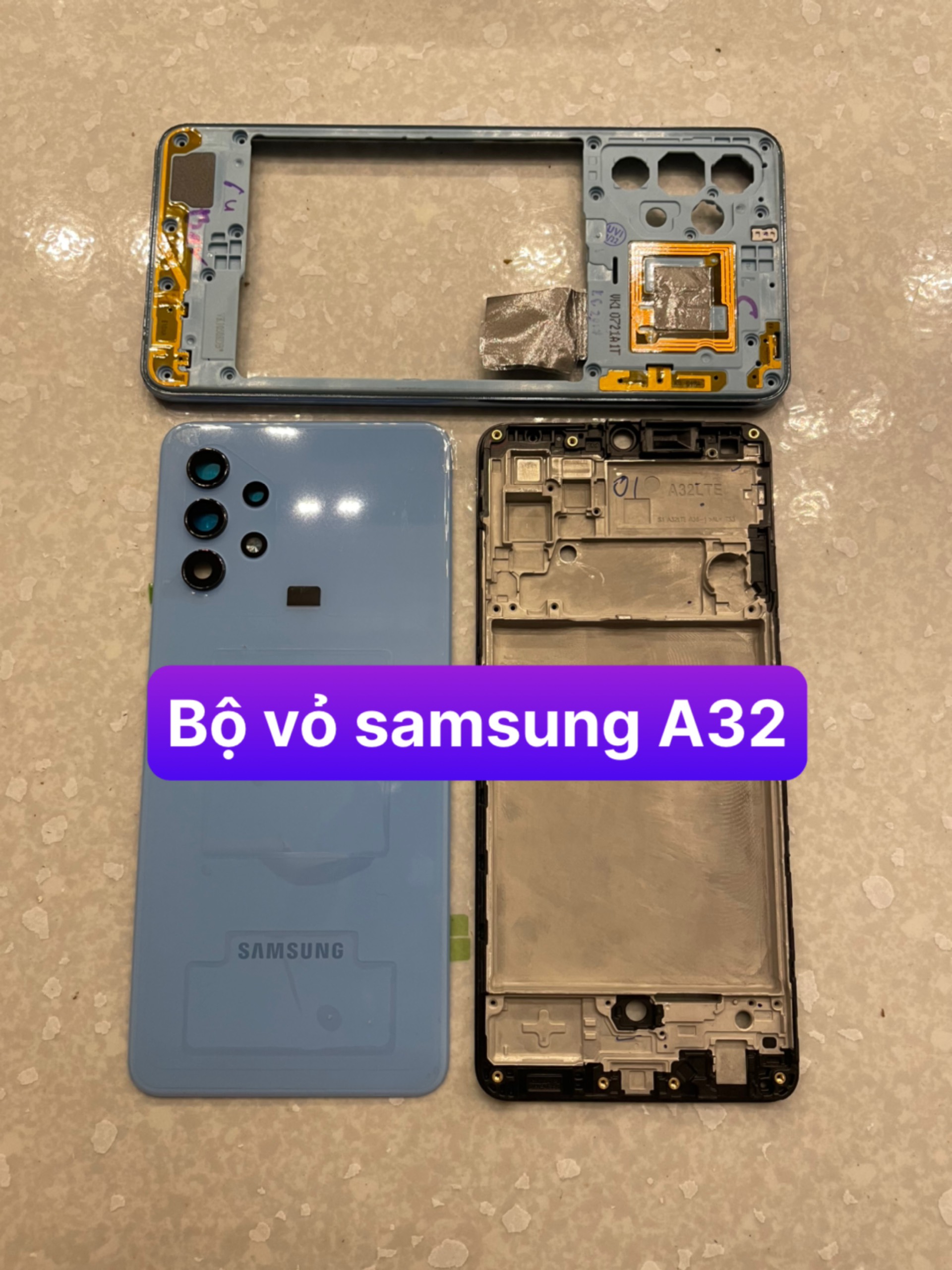 Bộ vỏ samsung A32 zin ( gồm ,lưng,sườn benzen ,kính cam ,nút bấn)