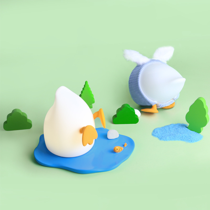 Sáng Tạo Silicone vịt đèn ban đêm cạnh giường ngủ đèn ngủ sạc điện thoại di động giá đỡ điện thoại thời gian ánh sáng mờ đèn vỗ