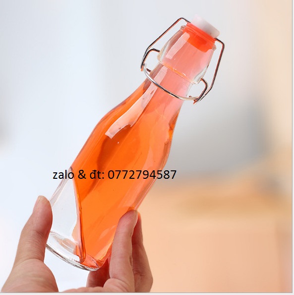 Chai Thủy Tinh tròn Nắp Gài 500ml