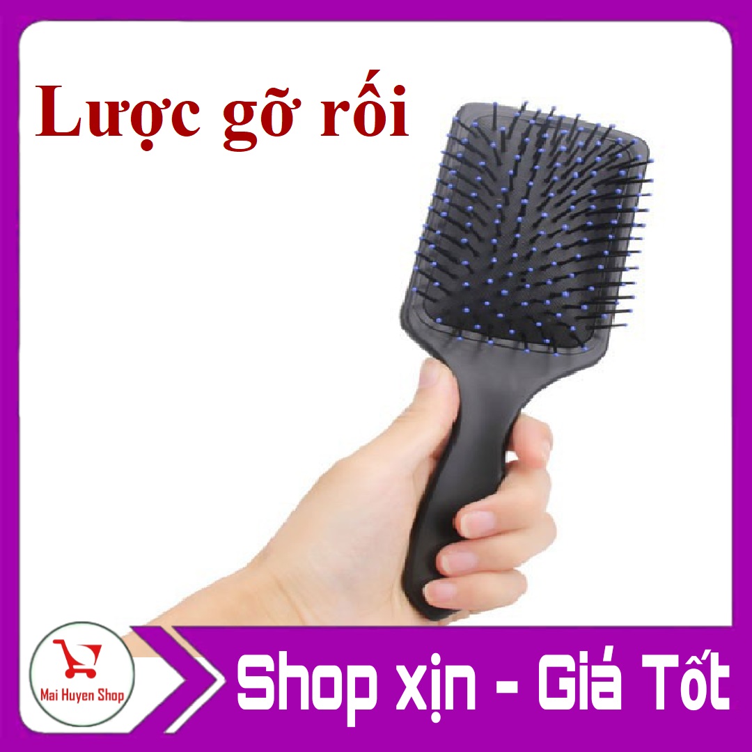 lược chải tóc chống rồi kiêm massage da đầu