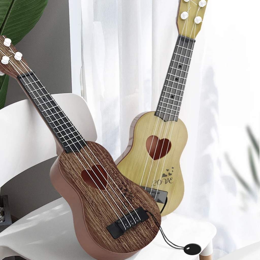 Đàn Guitar Mini 4 Dây Cho Bé Cảm Thụ Âm Nhạc Sớm
