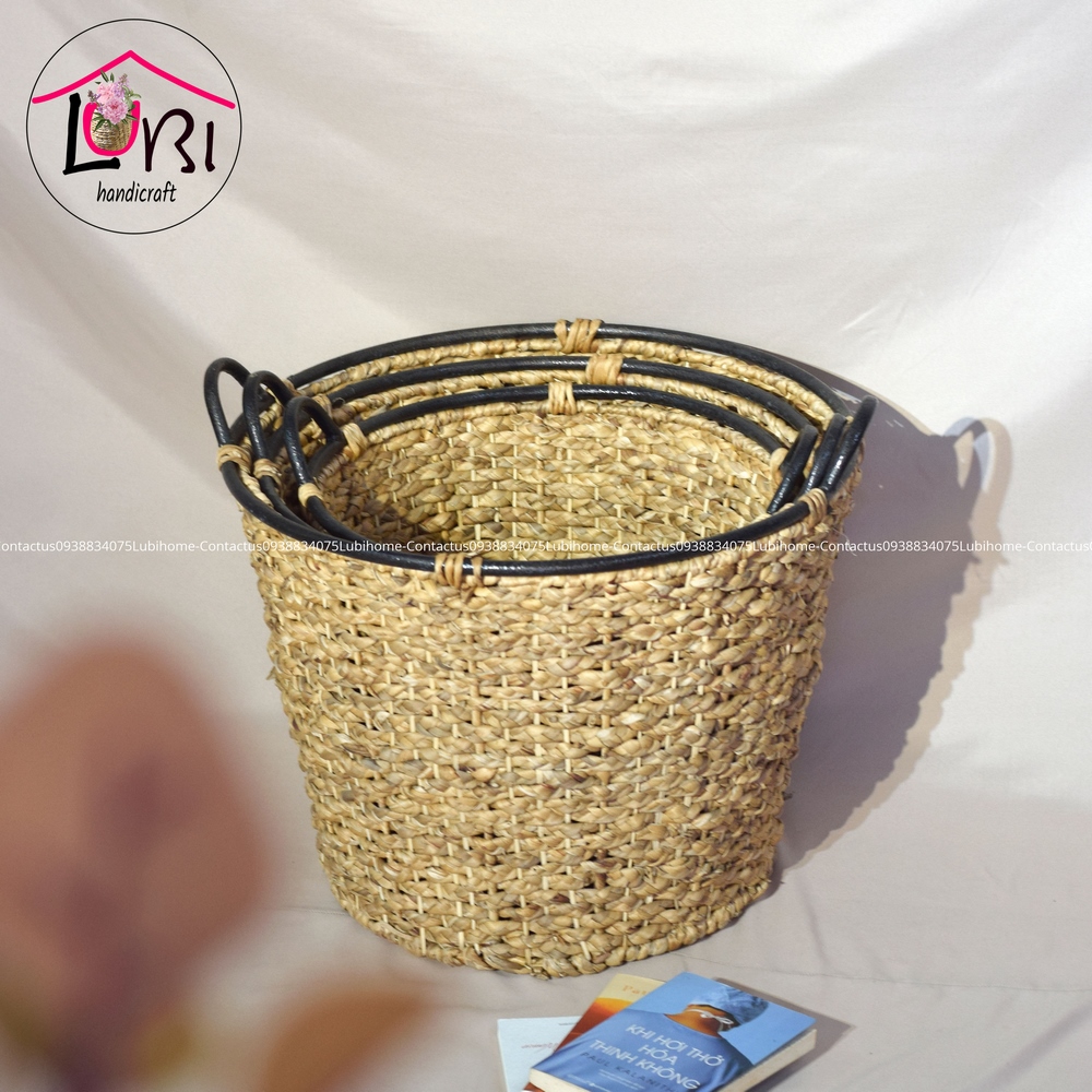 Round water hyacinth baskets with vintage iron handles