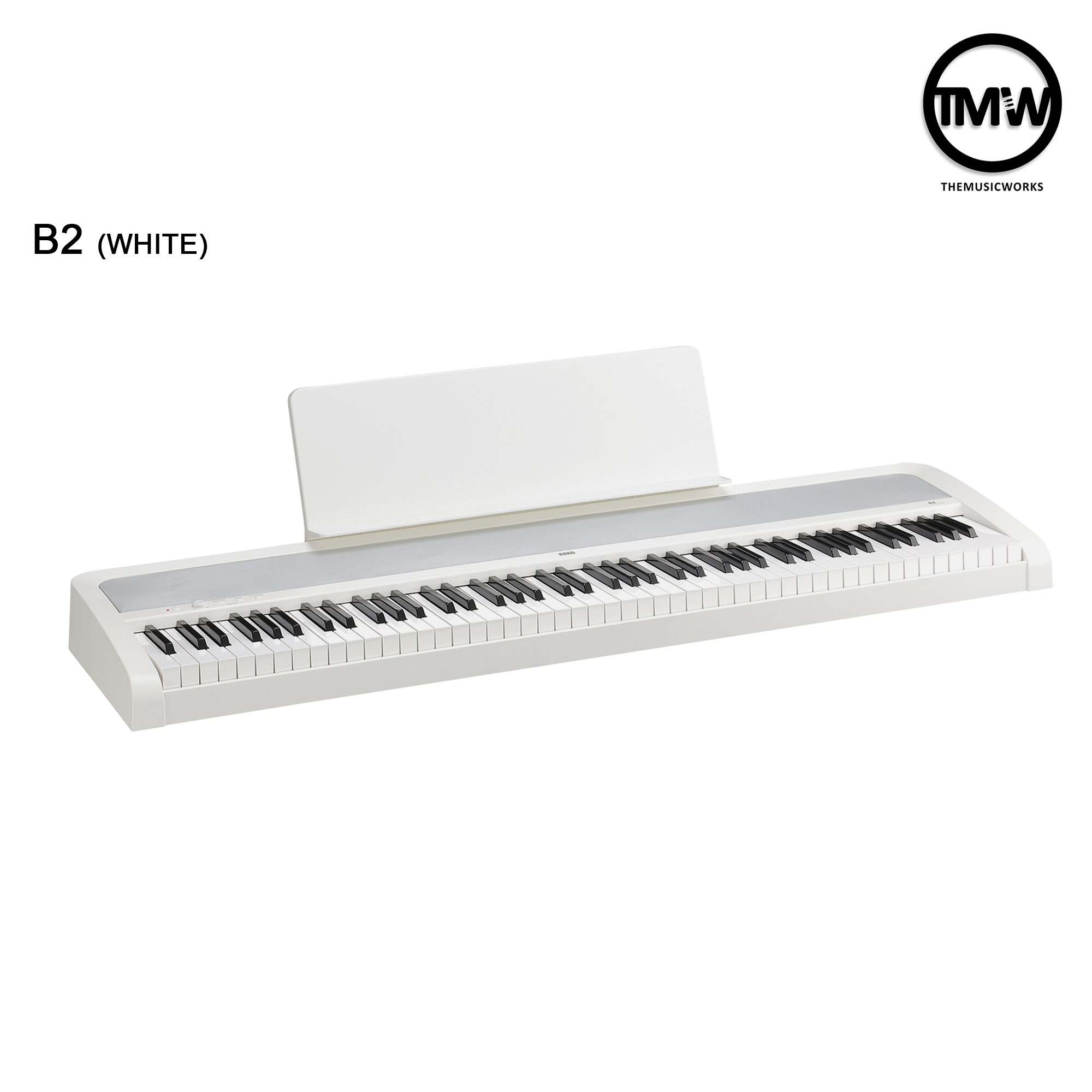 white electric piano keyboard