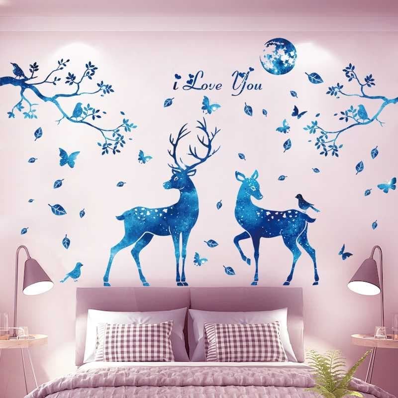 Decal dán tường hươu xanh và cô gái xe đạp