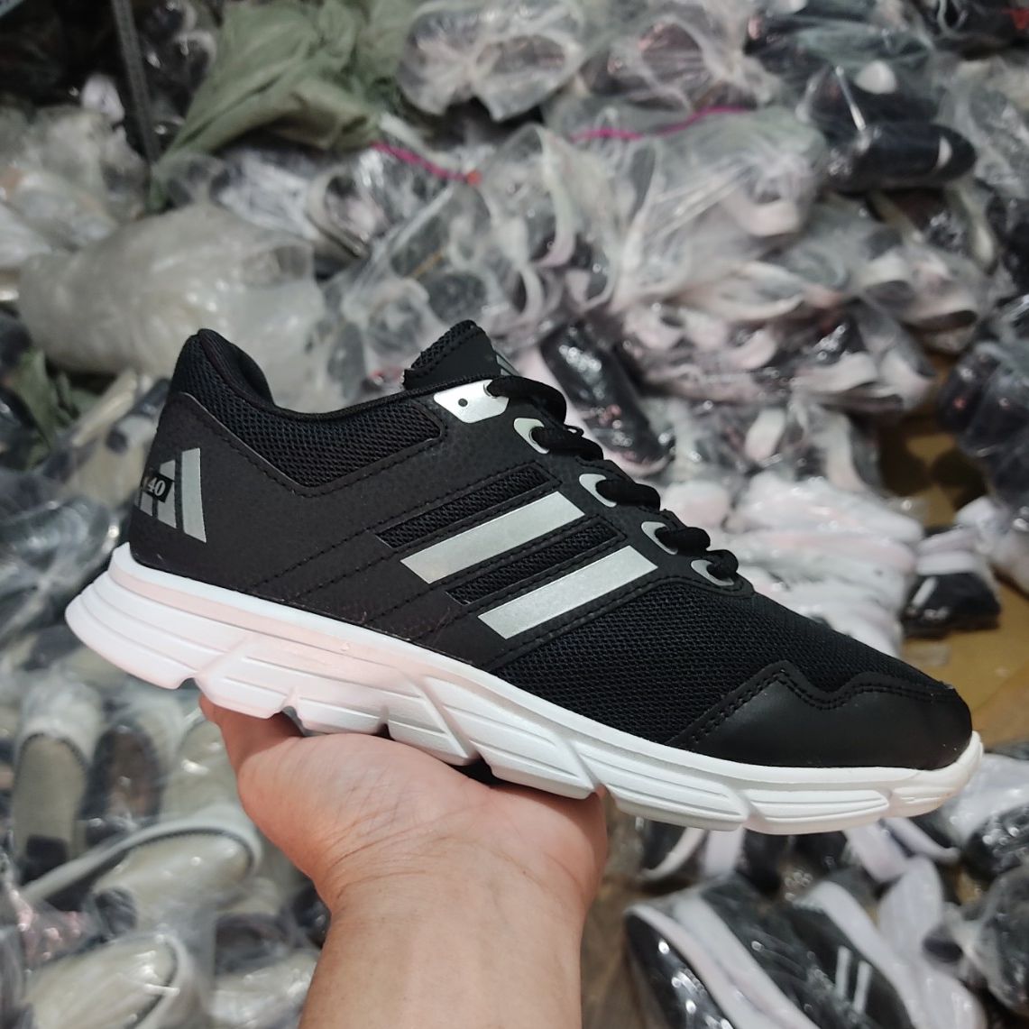 [HCM]Giày sneaker nam nữ đen sọc bạc SP104