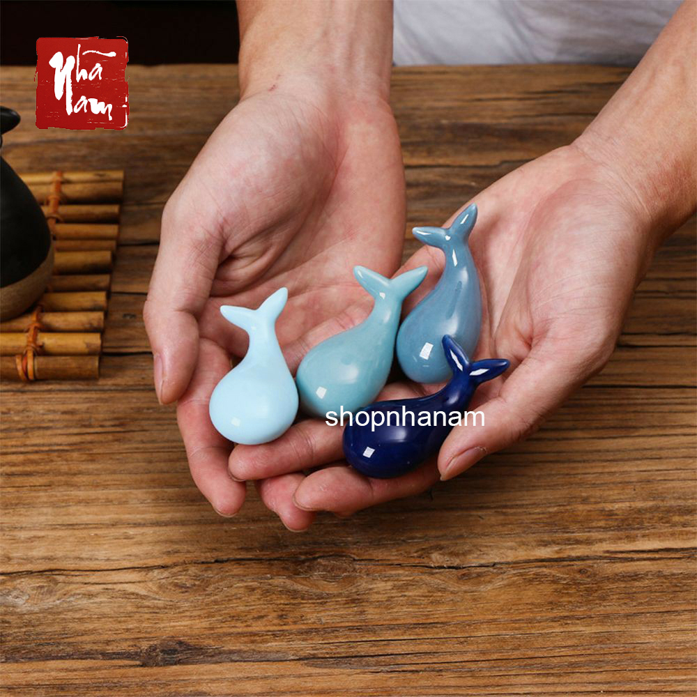 Ceramic Whale Statue Holding Chopsticks on the Dining Table