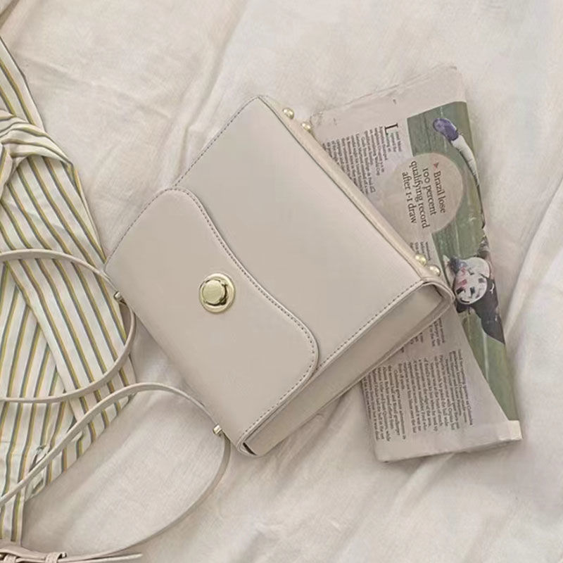Korean version niche design bag for women 2023 new minimalist portable shoulder bag with high quality, light , and versatile crossbody bag