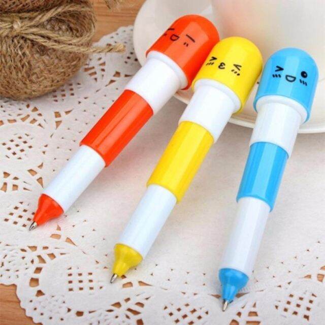 Bút bi mực xanh hình viên thuốc mặt cười