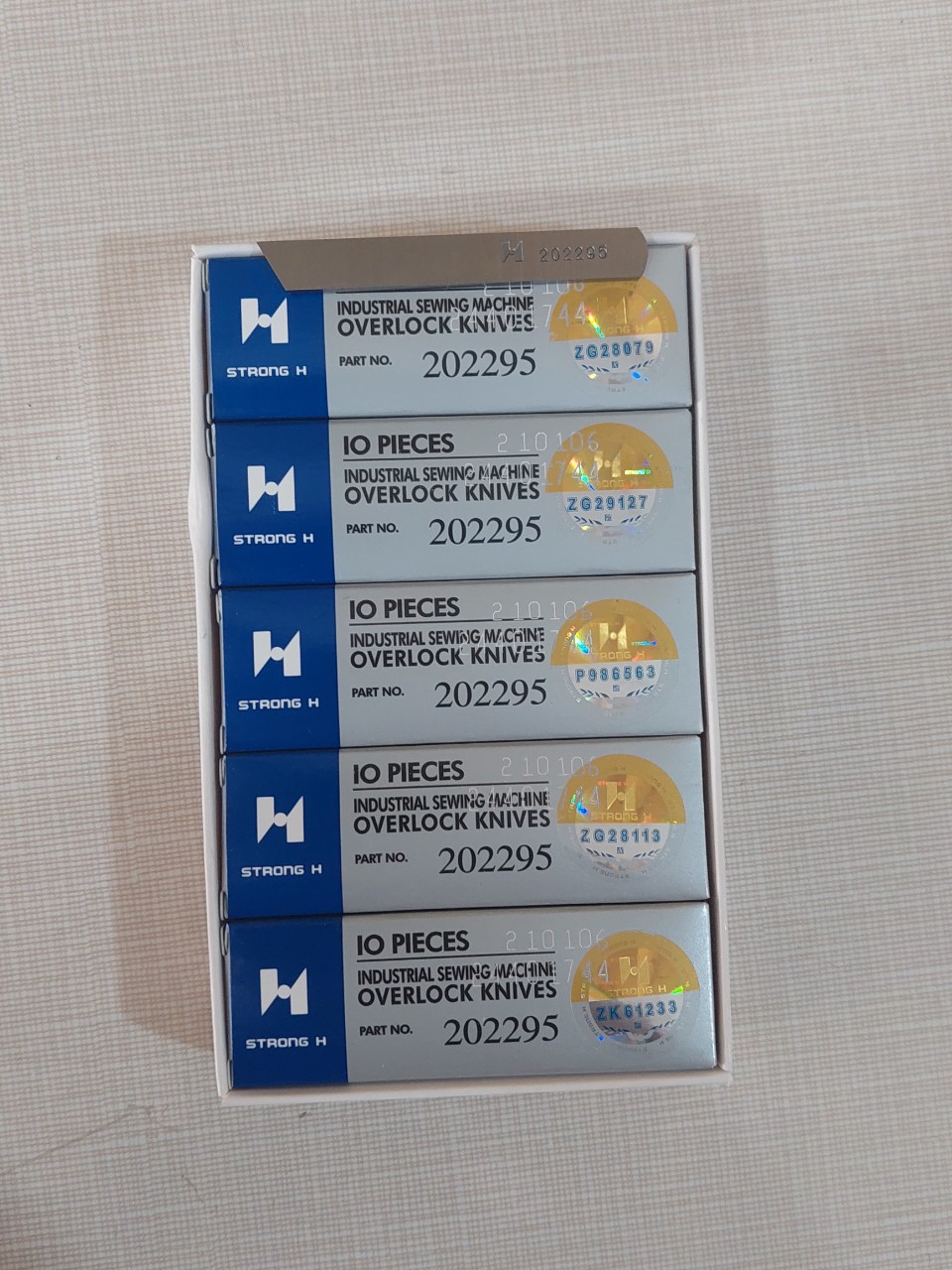lưỡi dao dưới máy vắt sổ công nghiệp