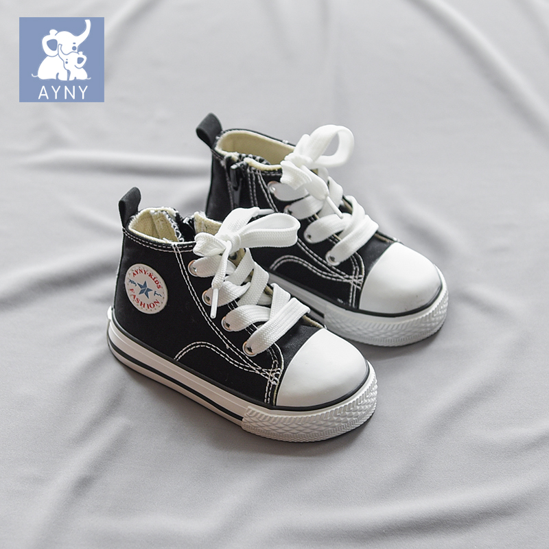 infant white canvas shoes