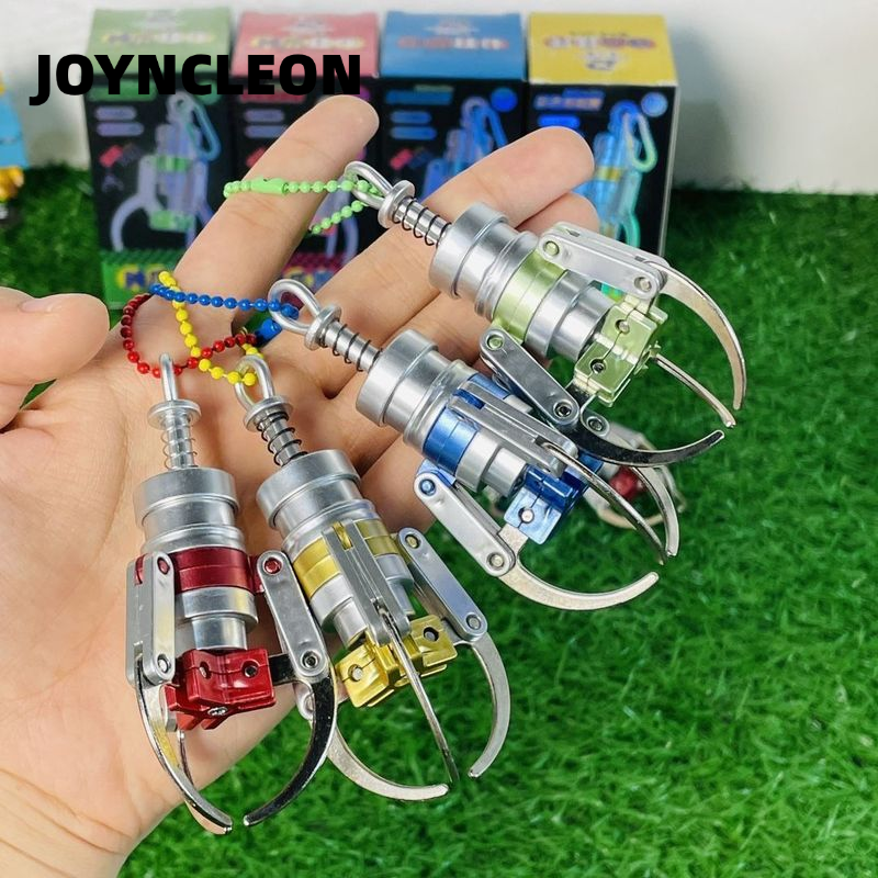 JOYNCLEON Sáng tạo cơ khí Claw đồ chơi căng thẳng Relief Keychain trang trí bàn cho trẻ em và người lớn
