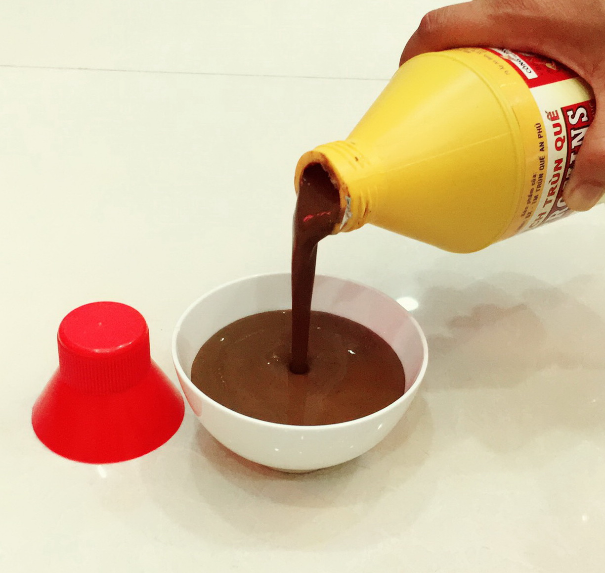 Dịch trùn quế làm mồi câu cá chai 1 Lit
