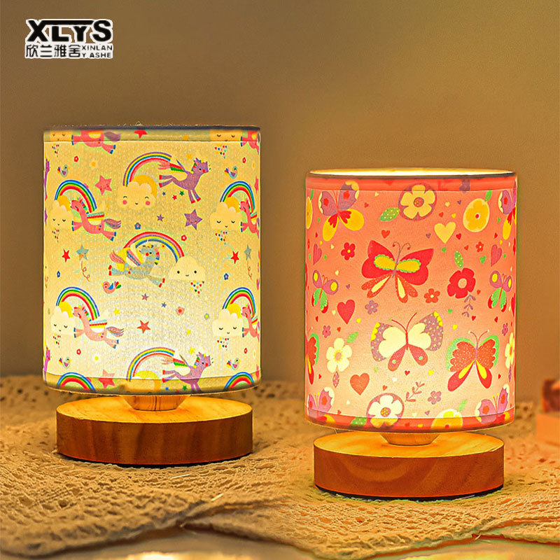 Cartoon bedroom bedside decoration table lamp simple personalized creative gift fabric warm solid wood dimming table lamp