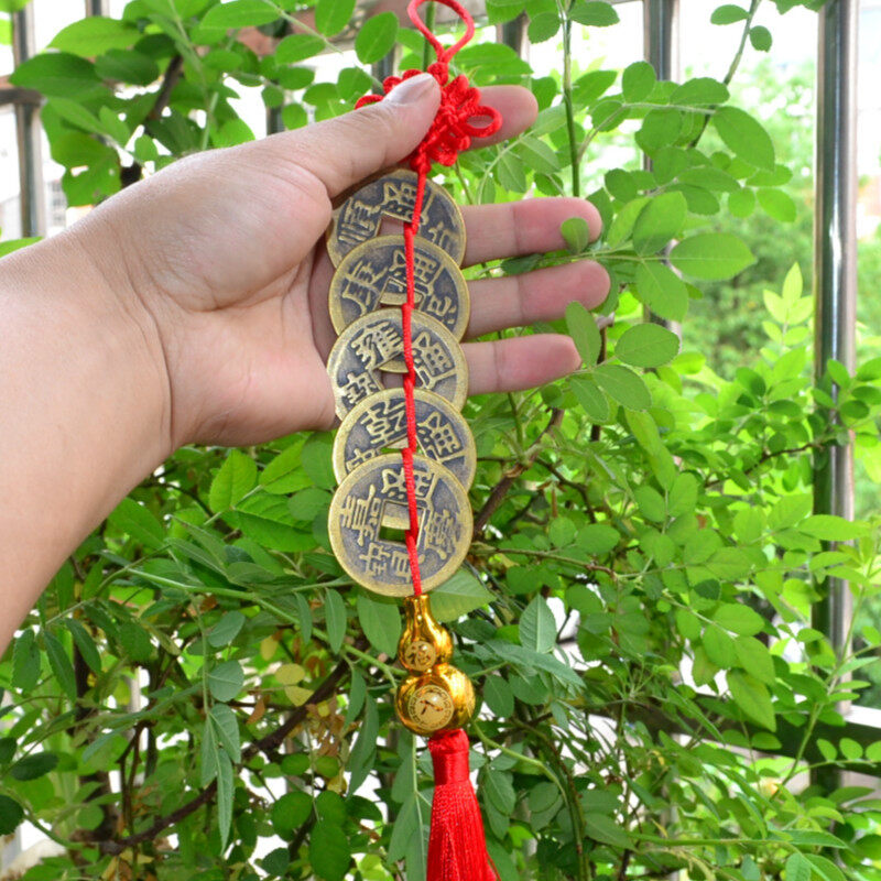 Kim treo Lý cổ cho năm đồng tiền của Hoàng đế Trung Hoa.