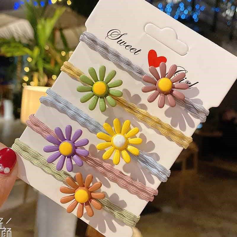 Dây buộc tóc hình hoa cúc (quà tặng)