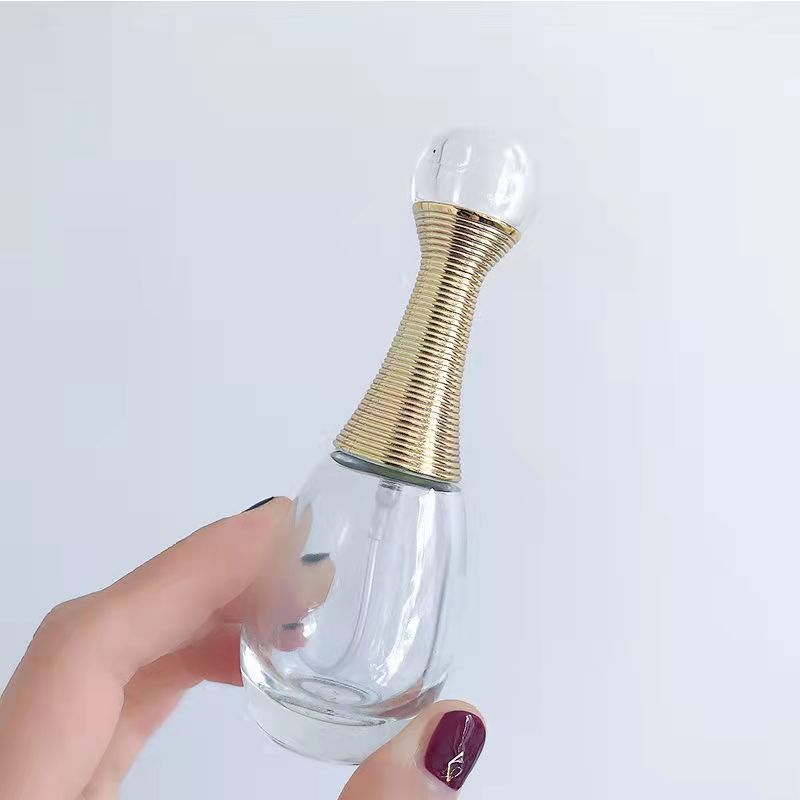 Chai chiết nước hoa 25ml kiểu J'adore trong suốt thân thủy tinh dày dặn, sang trọng.