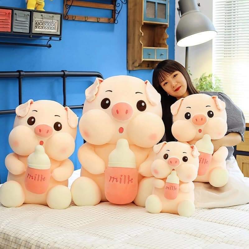 Gấu bông heo ôm bình sữa  - ôm trà sữa