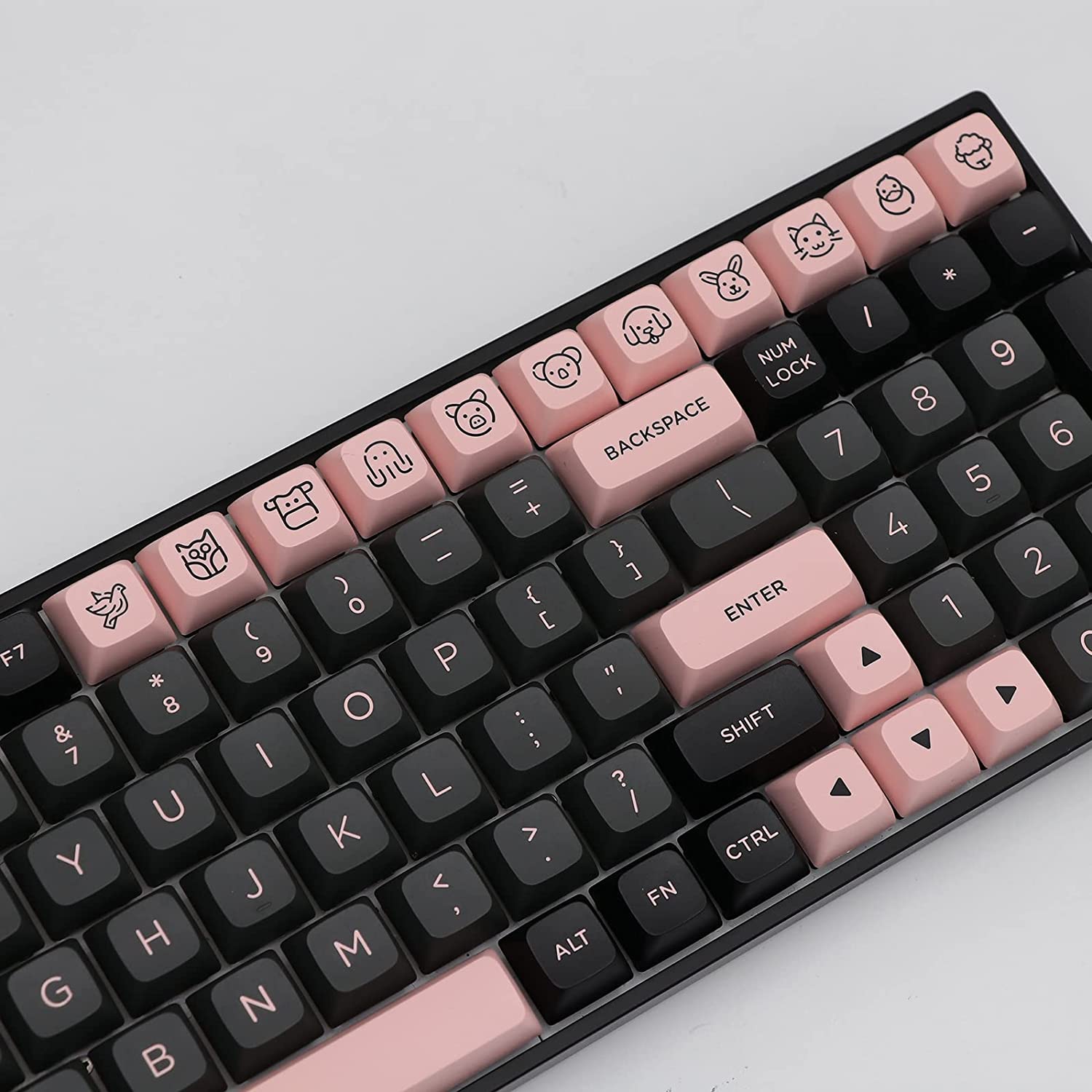 black keyboard with pink keycaps