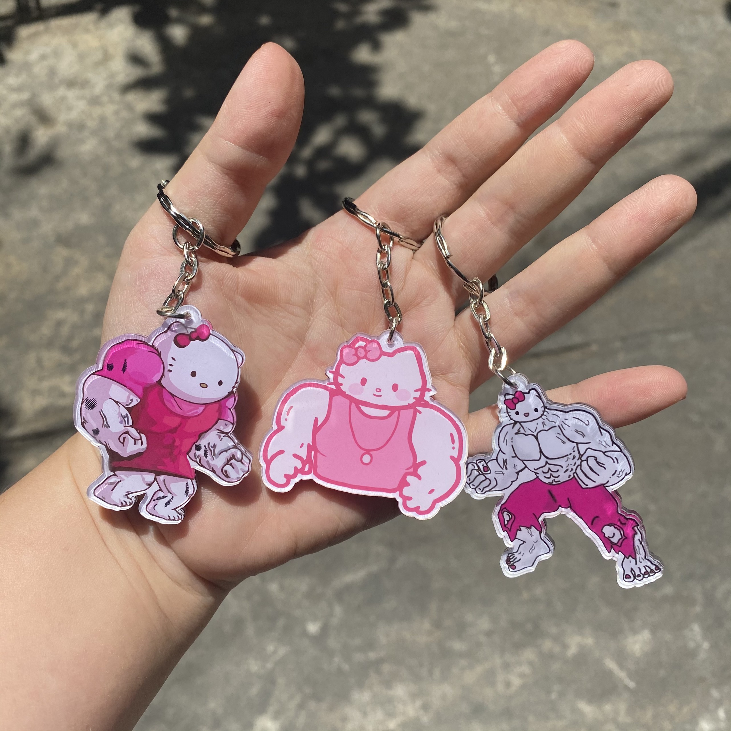 Móc khóa mèo Kitty đô con cơ bắp lực điền dễ thương