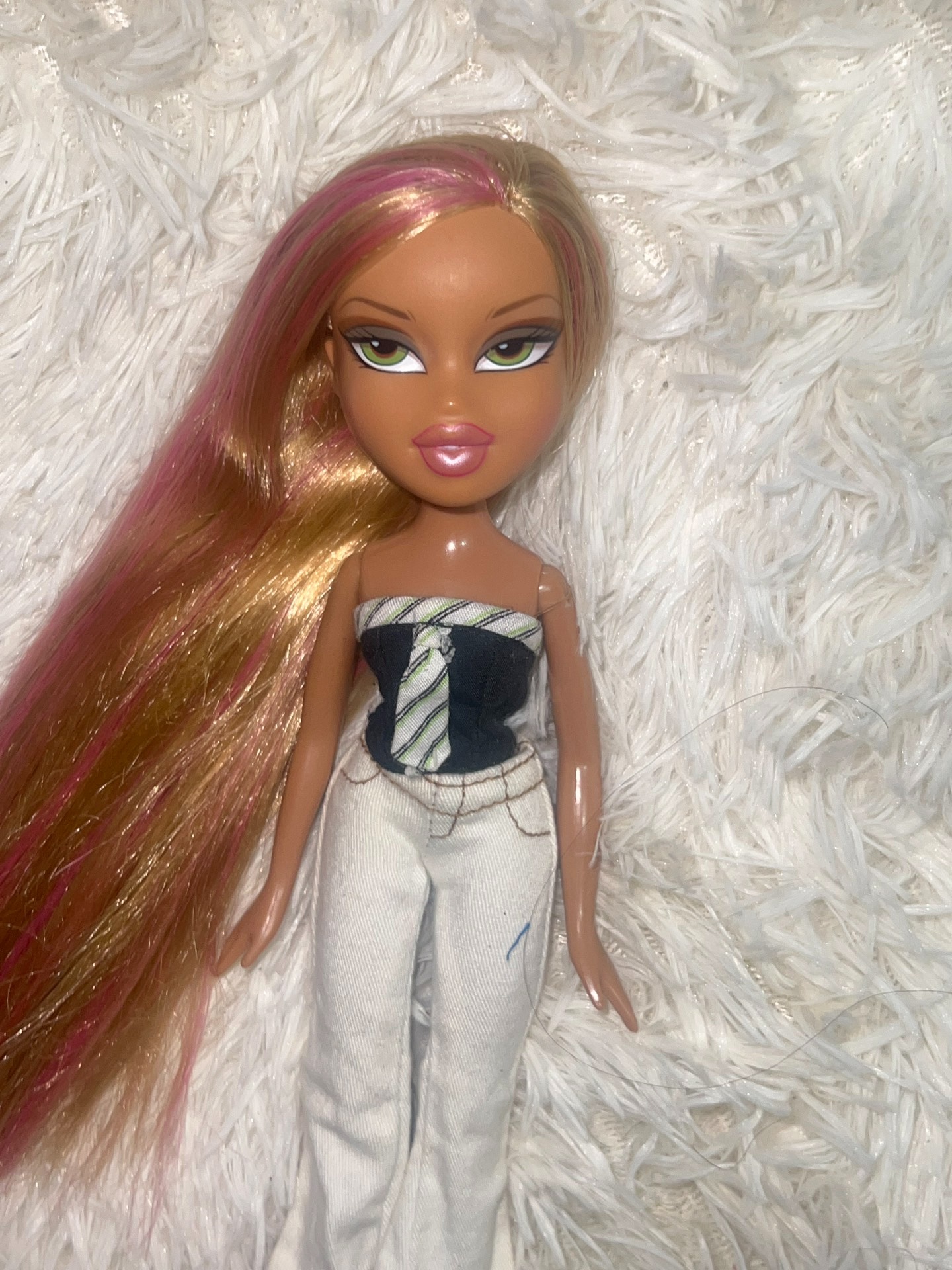 Bates doll bratz has long hair and Yasmine has green eyes. A rare hair is  also very good.