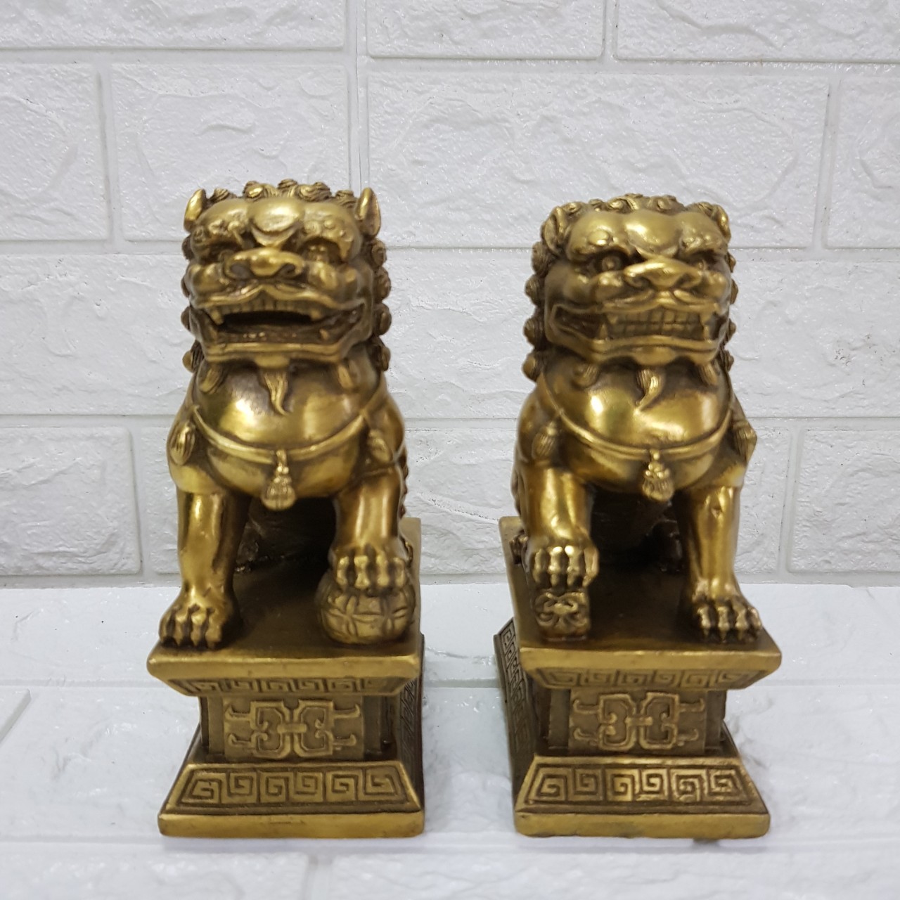 Cặp nghê ngồi bệ bằng đồng cao cấp