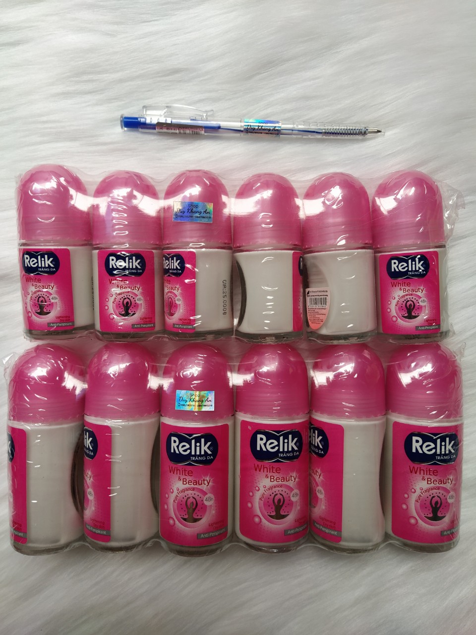 2 chai Lăn khử mùi Relik hồng chai 50ml