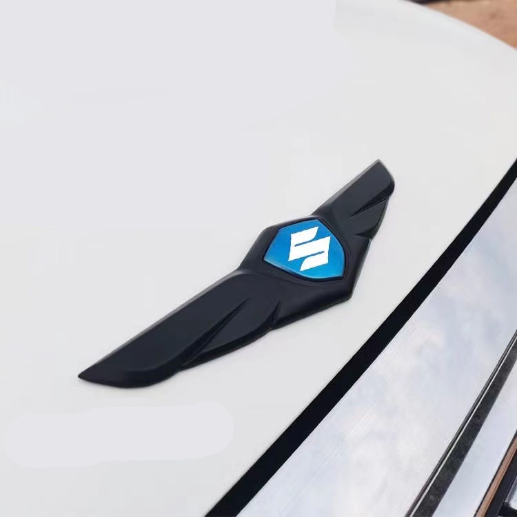 Chenjie High quality For Suzuki Stainless Steel Car Logo Car Front Cover Car Hood Metal Ornaments Angel Wings Sticker Car Decoration car accessories Alto Swift APV Ertiga Celerio Carry Grand Vitara Jimny Vitara Kizashi SX4 Swift Dzire Wagon R+ Baleno