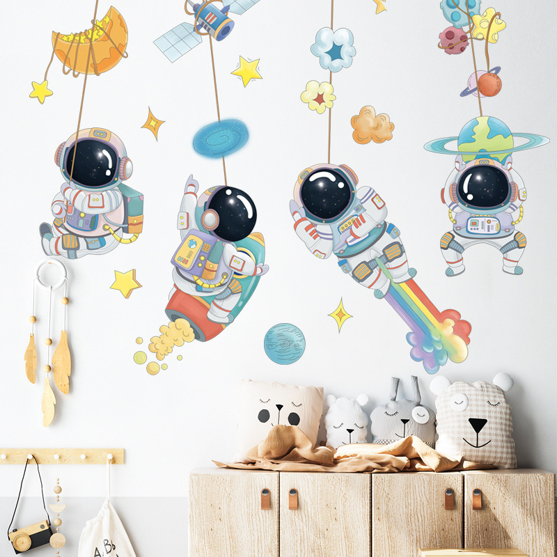 Decal dán tường vũ trụ phi hành gia đu dây