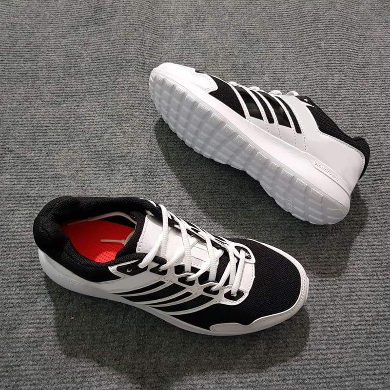 [HCM]Giày sneaker nam nữ trắng sọc đen SP110