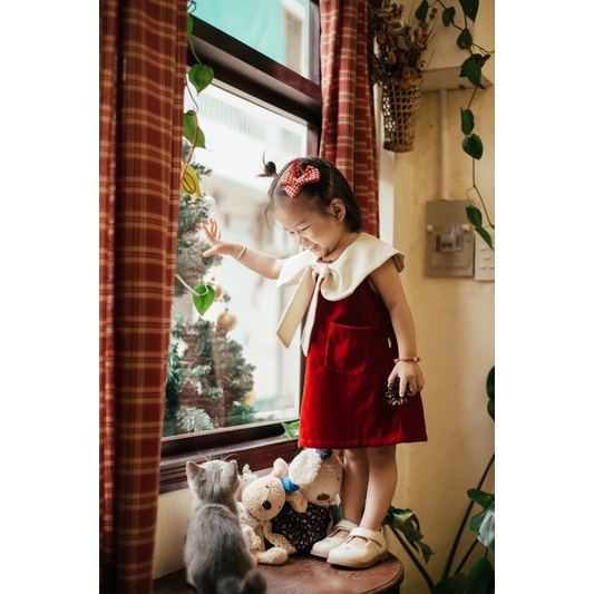 Váy đỏ nhung cổ nơ em bé nanci room