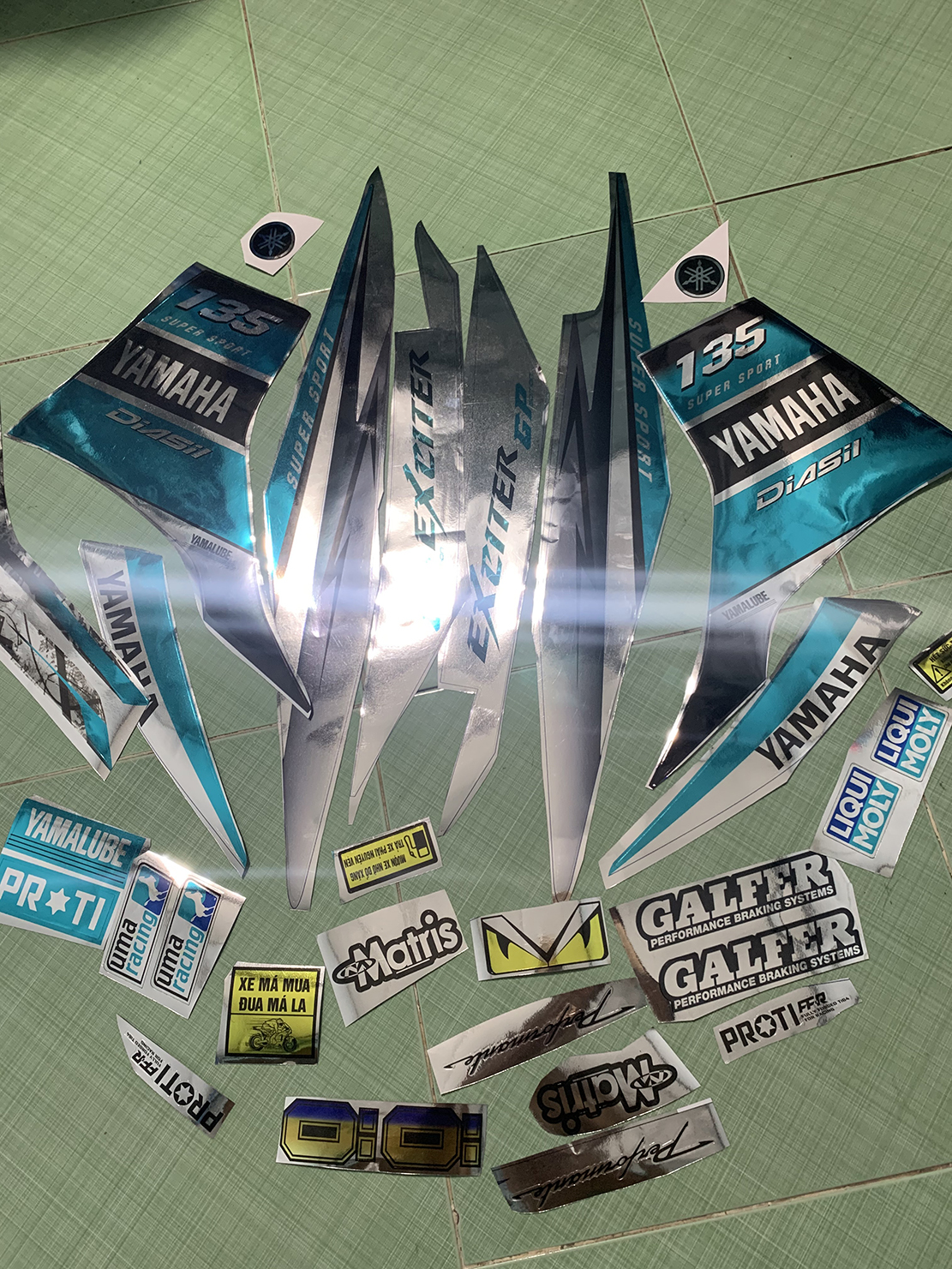 Tem exciter 135 crom xanh ngọc đen