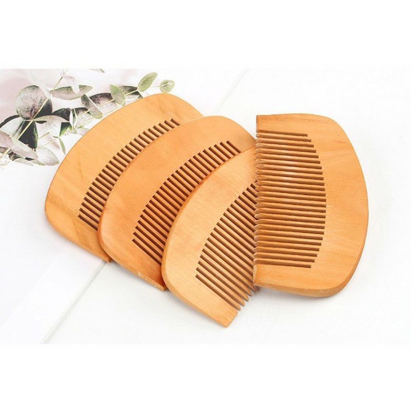 Lược chải tóc bằng gỗ massage đầu
