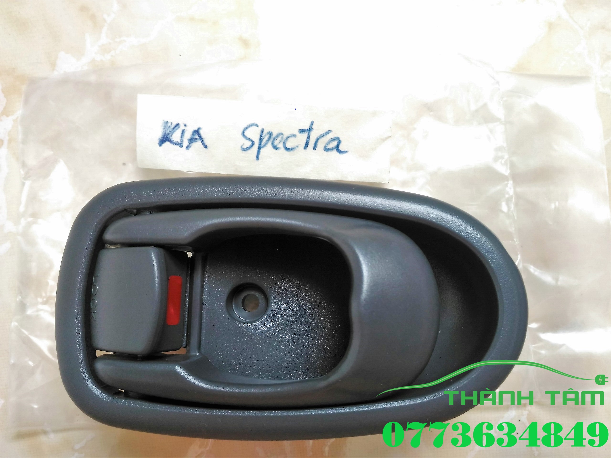 Tay mở trong kia spectra/ tay nắm trong kia spectra
