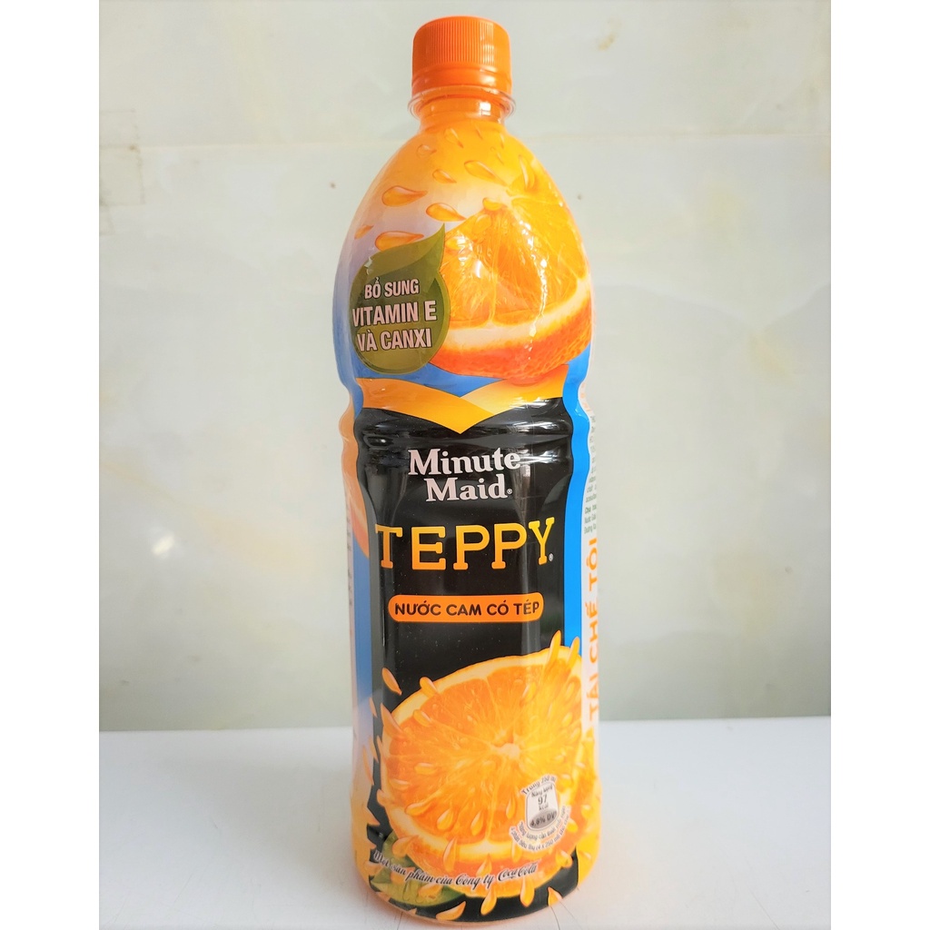 Chai nước cam có tép - teppy chai 1 lít date mới