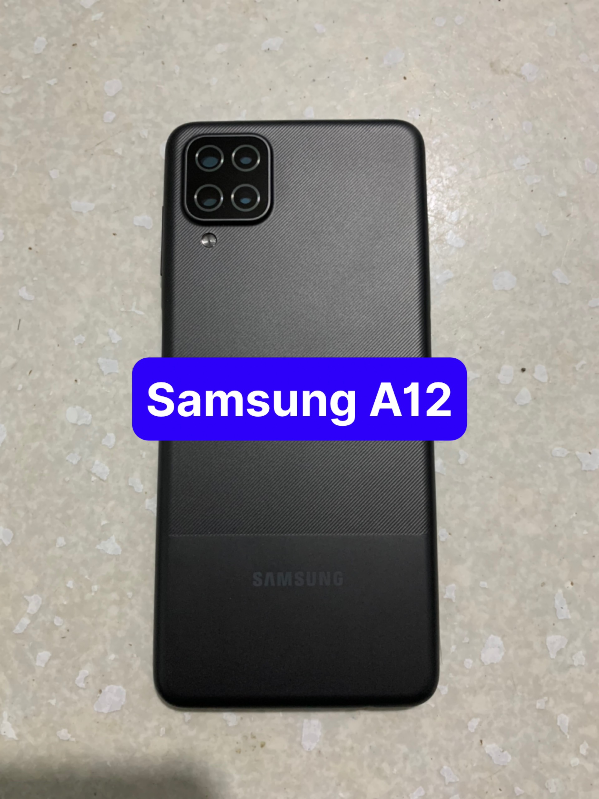 bộ vỏ samsung A12 ( gồm, sườn, lưng,kính cam,nút bấn