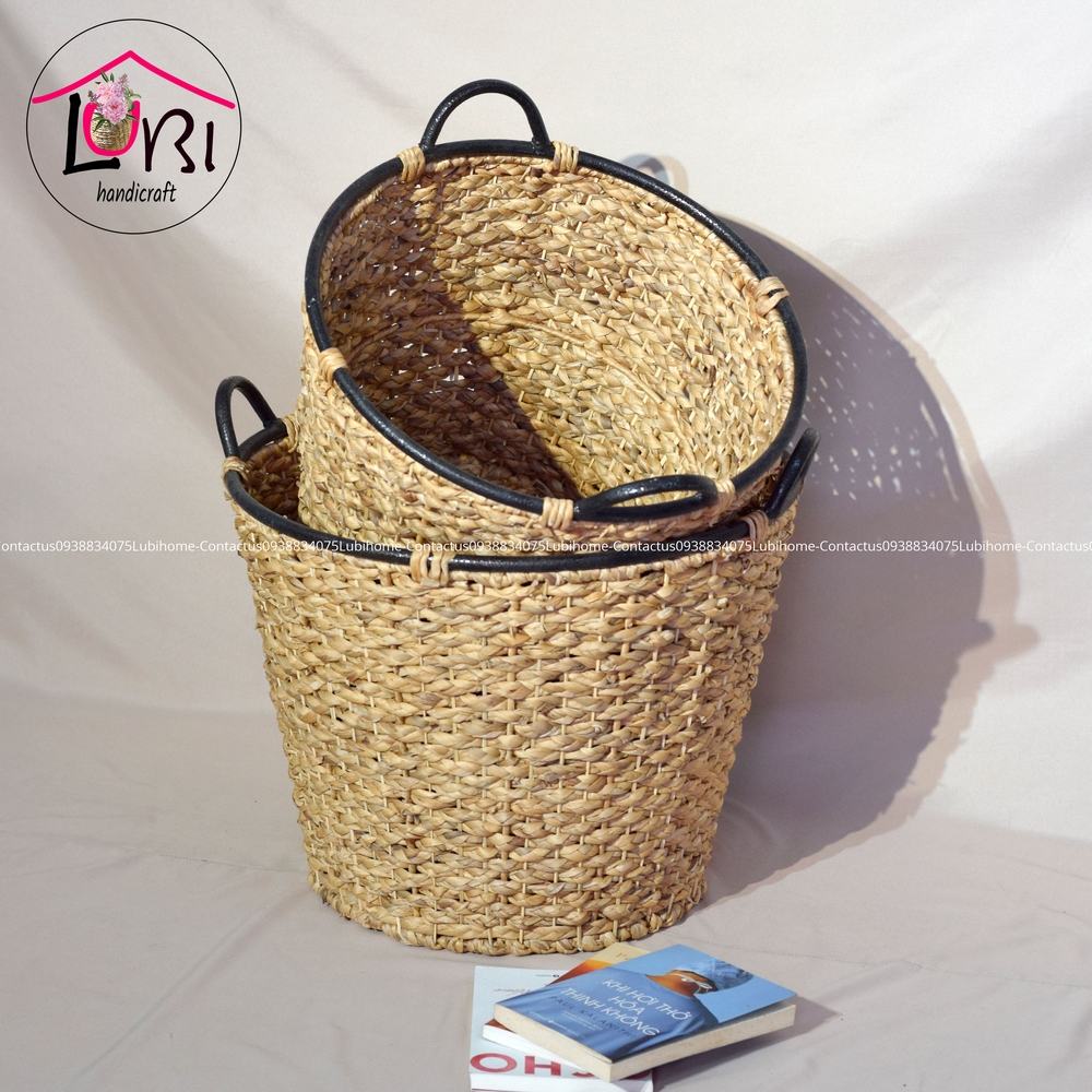 Round water hyacinth baskets with vintage iron handles