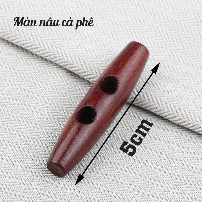 Nút gỗ dài 5cm 2 lỗ màu nâu dùng trang trí áo, túi xách, nón