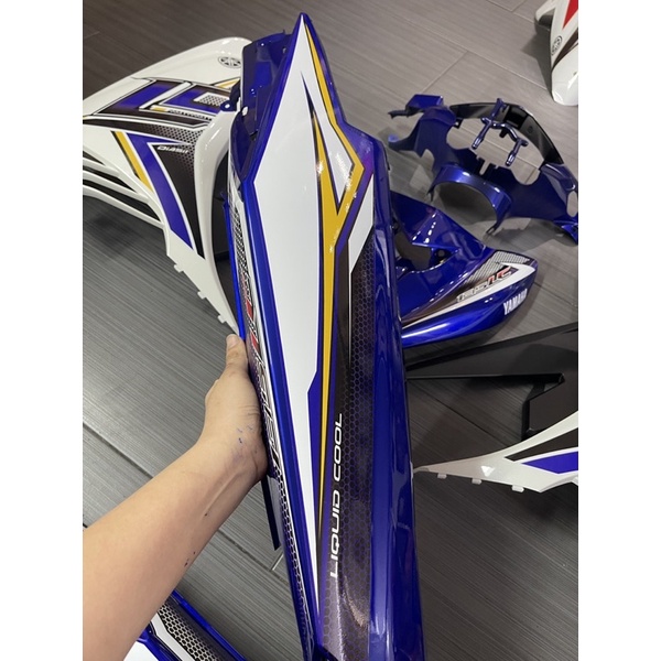 Dàn áo Ex 135 trắng xanh tem LC