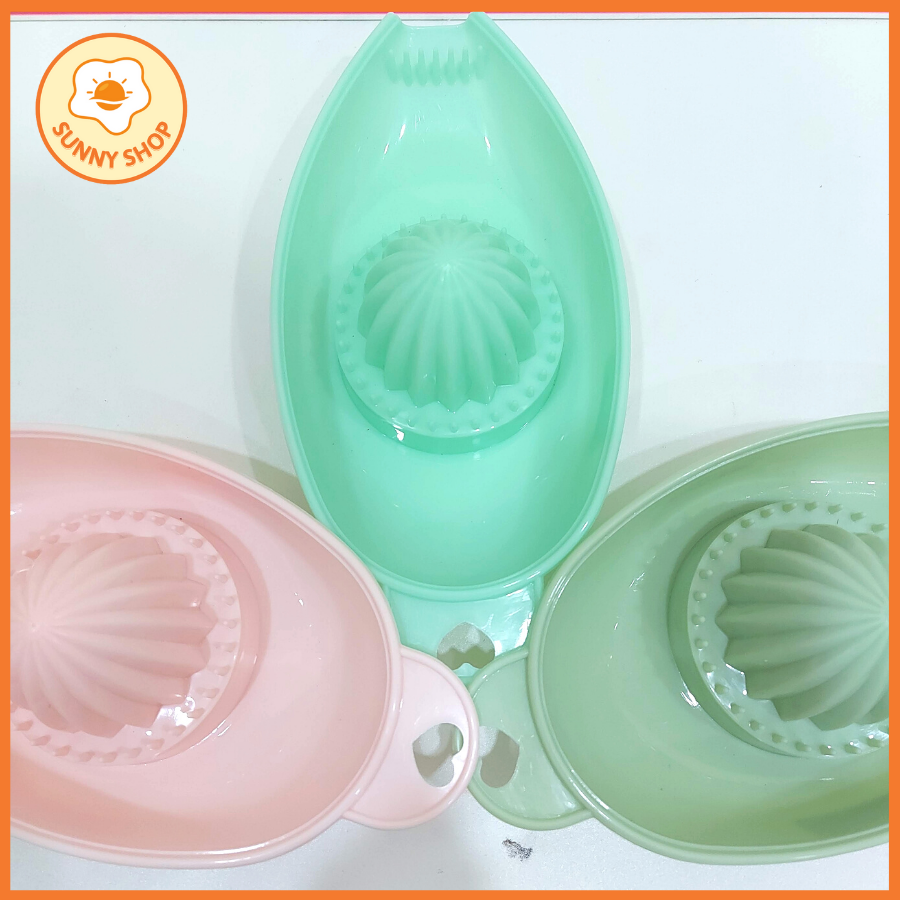 Dụng cụ vắt cam nhựa